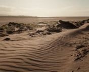 It&#39;s a neap tide on the Dee estuary, and as the wind picks up the exceptionally dry sand starts to move. In time-lapse, it almost seems to flow, like ripples on a pond. This was shot at Red Rocks, Hoylake, on 8th April 2014.nnProduced using Magic Lantern ETTR (4th April nightly build) and in camera deflicker, on a Canon 5DmkII, through a Canon CN-E 35mm T1.5 lens and Tiffen IRND 1.8 filter. It&#39;s a shot every 12 sec at T16 with shutter and ISO controlled by Magic Lantern. It ramped the exposure b