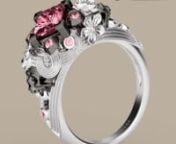 http://www.jeulia.com/two-skull-flower-design-princess-cut-pink-sapphire-rhodium-plated-sterling-silver-women-s-skull-ring.html