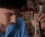 The proprietor of a musical instrument shop talks about the instruments of Uyghur music. Although Xinjiang is a part of China, the music, like the geography, is far removed from the Han lands to the east. Instruments include the Ghijek, Rawap, and Dutar.