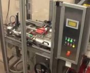 Video demonstrating Overwrapping assorted chocolate cartons with paper at speeds of 62 cartons per minute - Paper Overwrapping Machine LX100FF