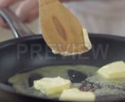 Get 100&#39;s of FREE Video Templates, Music, Footage and More at Motion Array: https://www.bit.ly/2UymF81nGet this here: https://motionarray.com/stock-video/butter-melting-on-frying-pan-74648nnThis stock video shows how butter is quickly melted on a frying pan. Four squares of butter are placed on a hot pan and spread around with a wooden spoon. Some of the butter have melted already from the heat. This clip is can be a good demonstration of one step in cooking. Use this clip for food-related and c
