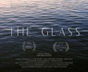 The Glass is a narrative short film that explores the intersection between climate change and gentrification in coastal communities. The story follows 19 year old Del, who searches for connection and a sense of direction as his family is forced to relocate due to rising sea levels. On his final night out he finds absolution, love, and develops a new relationship with his rapidly changing hometown.nnThe Glass World Premiered at the 29th Hamptons International Film Festival, where it screened alon