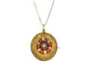 https://www.ross-simons.com/975611.htmlnnC. 1900. From our Estate collection and the Victorian era, this captivating pin/pendant necklace features a robust display of craftsmanship that brings authenticity to your look. The circular 14kt yellow gold pendant is dotted with 3-4mm round red and white coral beads and intricate swirls so eccentric they almost look hand-drawn! Opens in back to hold photo or small keepsake. Suspends from a box chain. Lobster clasp, coral bead pin/pendant necklace. Excl