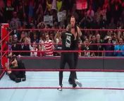 As Drew McIntyre and Shane McMahon brutalize Roman Reigns in a 2-on-1 Handicap Match, The Deadman rises to even the odds.