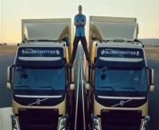 Van Damme performs the splits between two moving vehicles in a new advertisement for Volvo trucks.
