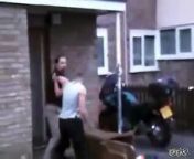 This guy tries to pick a fight with a neighbor and after beating up a garbage can he gets one punched then stumbles home.
