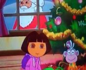 Dora sings with Santa Clause like a retard would and saves the day.