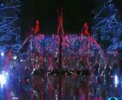 The dance troupe from Santa Clarita looks like human disco balls in their mirrored outfits!
