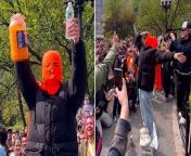 Hundreds gather in New York to witness man eat entire jar of cheese balls from tin and jar