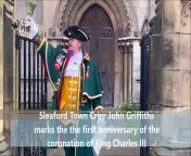 Sleaford Town Crier John Griffiths makes the proclamation in Sleaford Market Place for the King&#39;s Coronation anniversary.