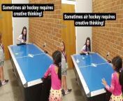 Kids these days are full of surprises and the creative youngling featured in this video is no different either!&#60;br/&#62;&#60;br/&#62;Shared by Jonathan Owen, this clip shows two girls having a somewhat competitive game of air hockey when one of them (wearing pink) decides to amp things up and surprise everyone. &#60;br/&#62;&#60;br/&#62;In order to secure a goal, she sacrifices her hand-held disc in a strategic manner, which leads to the plastic puck getting knocked into her opponent&#39;s goal. &#60;br/&#62;&#60;br/&#62;&#92;