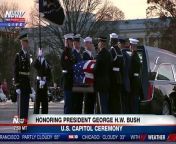The body of President George H W Bush is moved from the US Capitol Building to the Washington National Cathedral