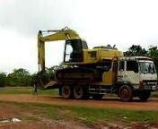 The Thais has their way of unloading excavator