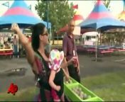 A dunk tank featuring a Casey Anthony look-alike at a Kentucky bluegrass fair drew crowds and mixed opinions before it was shut down.