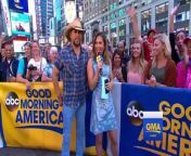 The country super star stops by Times Square ahead of his October Breast Cancer Awareness special at the Grand Ole Opry.