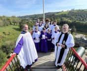 Choirs usually ascend their church towers to sing on Ascension Day. Instead, 10 of St German&#39;s cathedral’s choristers sang ‘Hail the day that sees him rise’ at the top of the iconic Laxey Wheel as part of a special service led by Dean Nigel Godfrey.