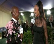Cynthia Erivo talks with La La Anthony at the 2024 Met Gala about her abs and her museum-quality Thom Browne outfit.