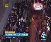 LAPD officers faced off with protesters in downtown Los Angeles after they were seen spray-painting and blocking streets.